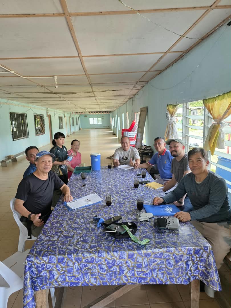 Field team gathered for a project coordination meeting